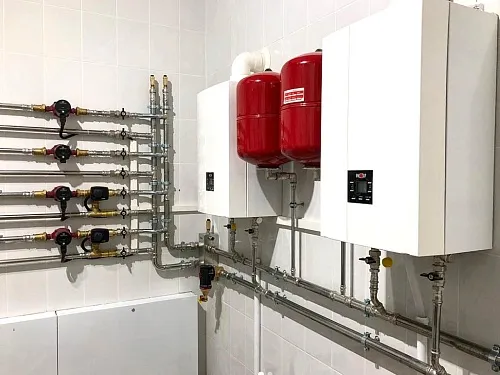 Отопление коттеджа в Ленинградской области каскадом 2 котлов WOLF Отопление коттеджа в Ленинградской области каскадом 2 котлов WOLF