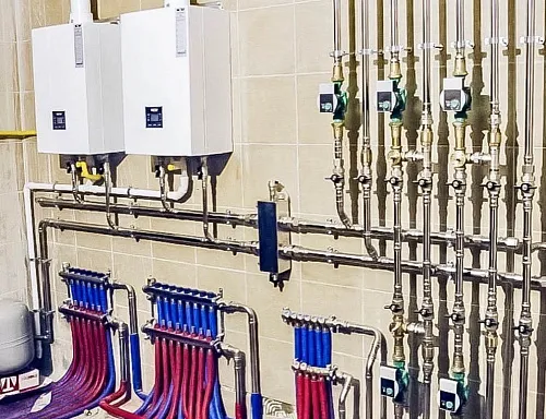 Нержавеющая система отопления смонтирована в частном доме 500 мм² на базе каскада 2-х котлов WOLF (г. Санкт-Петербург)